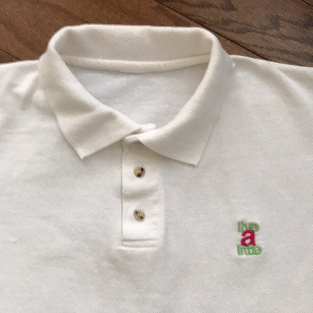 “Live a little” heavy material white polo XXL. Quality Excellent condition.